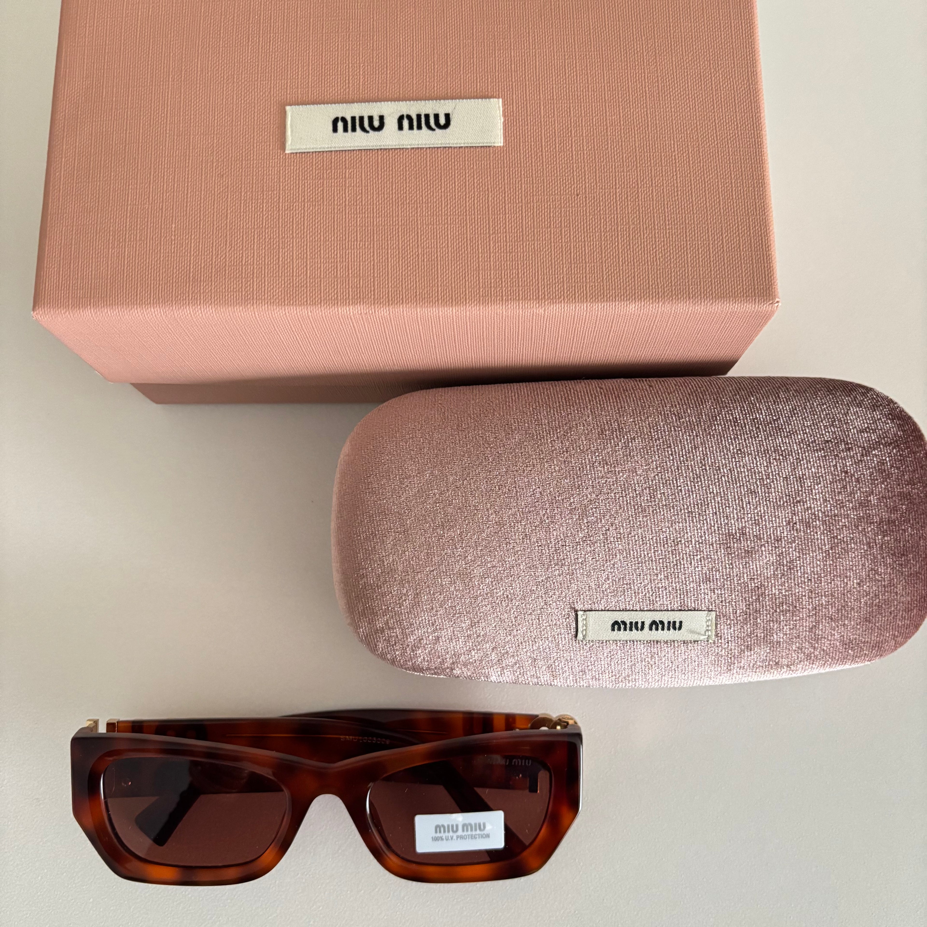 Miu Miu Rectangular Slim Havana Red